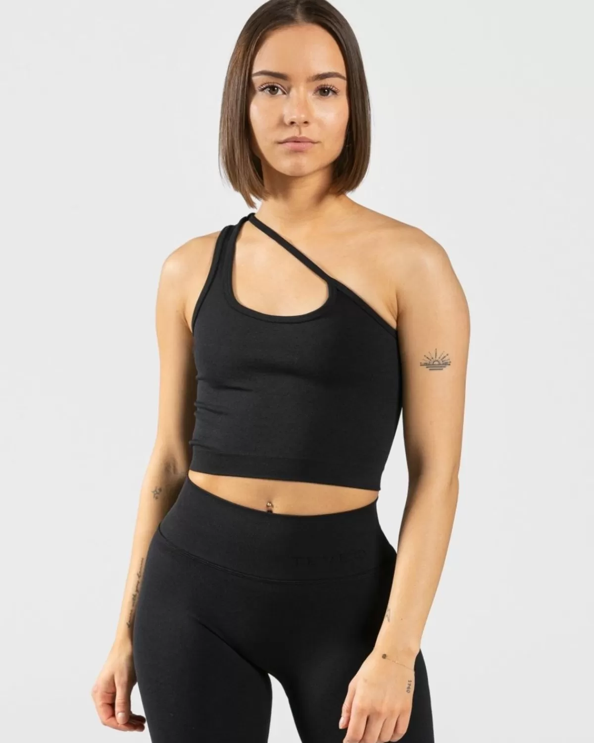 TEVEO Sassy One Shoulder Top "Schwarz" New